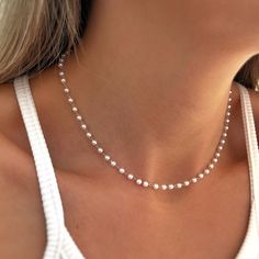 Our choker is adjustable with white pearls set. It is perfect to wear on a daily basis or on special occasions. It is a minimalist style, it is a very simple but at the same time elegant necklace. It combines with everything! A good gift idea. - MATERIAL: * Silver * 18 kt gold plating - CHAIN LENGTH: * 40 cm extendable to 5cm - PEARL DIAMETER: *4mm YOU CAN ALSO ASK FOR CUSTOM NECKLACE SIZE (Write us by message) All our jewelry is handmade with love, designed and created by us. We are lovers of jewelry and fashion, that is why we put so much passion into our work. MAD JEWELRY Simple Silver Jewelry, Stacked Necklaces, Silver Pearl Necklace, Heart Choker, Minimalist Gifts, Fresh Water Pearls, Gold Heart Necklace, For Her Gifts, Fresh Water Pearl