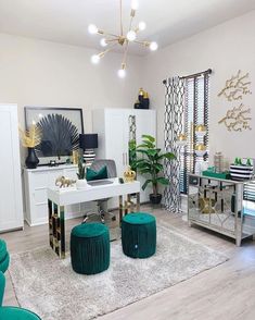 a living room filled with lots of furniture and decor on top of a hard wood floor