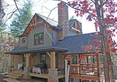 a house in the woods surrounded by trees