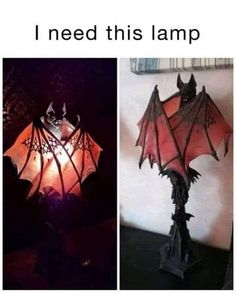 a lamp that looks like a bat hanging from the ceiling and on top of a table