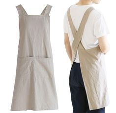 a man standing next to a white dress with suspenders on his back and an apron over his shoulder