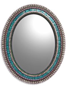 a round mirror with beaded border around it