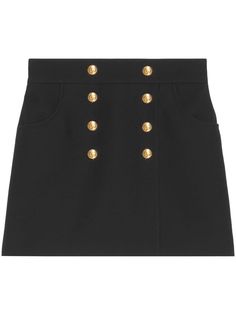 button-up crepe skirt from Gucci featuring black, wool-silk blend, crepe texture, gold-tone buttons, concealed rear zip fastening, two rounded pockets to the sides and thigh-length. This item is in size 40 and the color is Black Gucci Cruise, Crepe Skirt, Gucci Mini, Crepe Skirts, Silk Crepe, Denim Pant, Skirt Black, Black Wool, T Shirt Dress