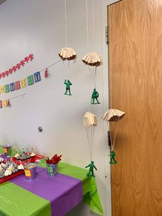 a table with some decorations on it in front of a door