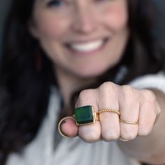 Recycled glass bottles are collected from bars, restaurants, friends, and dumpsters (really!) and transformed into the ultimate "cocktail" ring in our studio! 22K gold plated pewter. Glass approximately .75 inch by .75 inch square. Adjustable band for custom fit size 4-9 and the matte finish brings out the color.  Pine is from a red wine bottle Recycled glass and gold plated pewter. Use a jewelry cloth to polish band. Stocking Fillers For Him, Recycled Wine Bottle, Smart Glass, Recycled Glass Bottles, Red Wine Bottle, Sustainable Accessories, Dumpsters, Stocking Fillers For Her, Forever Jewelry