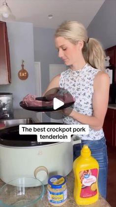 a woman is cooking in the kitchen with her crock pot and ingredients on the counter