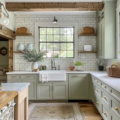 Sage green cabinets adding a pop of color to a farmhouse kitchen design Rustic Beach House Interior, Scottish Kitchen, Shabby Chic Kitchen Ideas, Modern Farmhouse Colors, Modern Farmhouse Kitchen Design, Big Kitchen Ideas, Farmhouse Color Palette, Shabby Chic Farmhouse Decor, Chic Farmhouse Decor