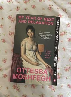 a book on the cover of my year of rest and relaxation by ottessa moshfegh