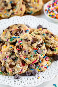 chocolate chip cookies with sprinkles on a white plate