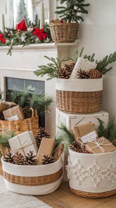 three baskets filled with presents sitting on top of a wooden floor next to a fireplace