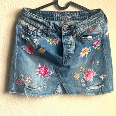 A Cute Denim Mini Skirt With Floral Embroidery From A&F. It Is Perfect For Summer !! Never Worn Spring Embroidered Denim Skirt, Embroidered Medium Wash Denim Skirt, Spring Embroidered Cotton Denim Skirt, Spring Mini Skirt With Floral Embroidery, Spring Embroidered Medium Wash Denim Skirt, Spring Embroidered Blue Denim Skirt, Denim Skirt With Floral Embroidery, Embroidered Denim Skirt In Blue, Embroidered Fitted Denim Skirt