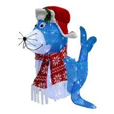 a blue dog wearing a santa hat and scarf