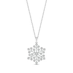 Shimmering with wintry wonder, this intricate snowflake necklace is crafted in cool sterling silver. A flurry of glistening diamond accents adorn the design. The pendant sways from an 18-inch cable chain that secures with a lobster clasp. Silver Snowflake Necklace For Holiday, Winter White Sterling Silver Necklaces, Elegant Silver Necklace For Winter, Elegant Holiday Snowflake Necklace, Elegant White Holiday Necklaces, Elegant Silver Necklace, Intricate Snowflake, Snowflake Necklace, Accessories Jewelry Necklace