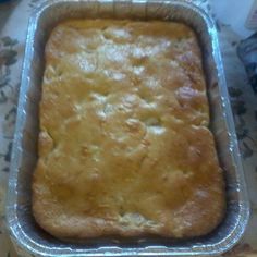 a pan filled with food sitting on top of a counter