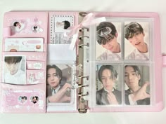 an open pink book with photos and stickers on it