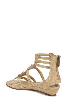 A tapered woven wedge lofts a strappy sandal designed with glitzy beaded accents that are perfect for a vacation look. 1" heel (size 8.5) 4" ankle shaft Back zip closure Adjustable ankle straps with buckle closures Synthetic and textile upper/synthetic lining/rubber sole Imported Gold Adjustable Wedge Heel Sandals, Adjustable Gold Open Toe Wedge Sandals, Gold Embellished Synthetic Sandals, Gold Sandals With Woven Sole And Ankle Strap, Gold Sandals With Woven Sole For Beach, Gold Ankle Strap Sandals With Woven Sole, Gold Embellished Wedge Sandals For Beach, Adjustable Gold Synthetic Wedge Sandals, Gold Adjustable Synthetic Sandals