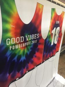 a tie - dyed vest is on display in a store for good vibes powerpuff 2011