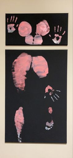 two black and pink paintings with handprints on them, one has a child's hand