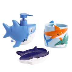 three different types of toothbrush holders with sharks and shark heads on them, one is blue the other is orange