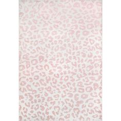 a pink and white leopard print rug