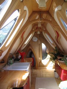 the inside of a house that is made out of wood