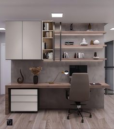 an office with a desk and shelves on the wall, along with a chair in front of it