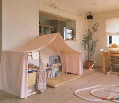 a play tent in the middle of a living room