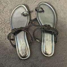 Size 9 Never Worn Jessica Simpson Sandals Silver Open Toe Synthetic Sandals, Chic Silver Flat Sandals, Silver Flat Sandals For Evening, Silver Synthetic Sandals For Evening, Elegant Silver Flat Sandals, Jessica Simpson Sandals, Jessica Simpson Shoes, Jessica Simpson, Black Sandals