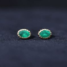 Product Details Make a bold statement with these stunning Emerald Stud Earrings that exude elegance and magnificence. Featuring Oval Cut Emerald in a Engraved Bezel Setting, these Solitaire Stud Earrings are perfect for everyday wear. Meticulously crafted with high-quality Solid Gold, these Emerald earrings make an excellent gift for your significant other. Product Information SKU SHP-EARRINGS112111653 Length 8 mm Width 6 mm Height 3 mm Weight 1.26 gm (Approximate) EMERALD INFORMATION No.of Ston Emerald Stud Earrings, Emerald Earrings Studs, Solitaire Studs, Signature Jewelry, Emerald Earrings, Timeless Jewelry, Significant Other, Conflict Free Diamonds, Bezel Setting