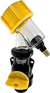 a yellow and black water pump with a plastic cap on it's head, attached to a white background