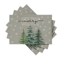 four napkins with christmas trees on them