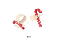 two red and white candy canes tied together