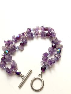 Double strand purple amethyst bracelet with toggle clasp 7 1/2 inches long Double Strand Amethyst Gemstone Beads Jewelry, Purple Gemstone Beads For Jewelry Making, Amethyst Round Beads For Jewelry Making, Healing Beaded Amethyst Jewelry, Healing Amethyst Beaded Jewelry, Amethyst Double Strand For Jewelry Making, Purple Double Strand Natural Stones Jewelry, Purple Double Strand Jewelry With Natural Stones, Double Strand Purple Jewelry With Natural Stones