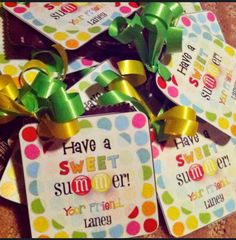 several tags with bows on them that say have a sweet summer and have some kind of candy