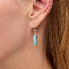 Jay King Sterling Silver Campitos Turquoise Drop Earrings  Add a touch of natural gemstone color to any ensemble with these simple, Campitos turquoise earrings. An elongated oval shape and beautiful, blue-green colors make the handcrafted drops an easy accessorizing choice appropriate for most any occasion. From Jay King.       Approx. 1-3/8"L x 1/4"W     Stamped .925     Pierced with wire backs     Sterling silver earrings have bezel-set, oblong ovals of blue-green turquoise   Stone Information       All sizes and weights approximate     Stabilized Campitos Turquoise - Oval (5x18mm); mined in Mexico Sterling Silver Turquoise Single Earring, Turquoise Sterling Silver Single Earring, Minimalist Turquoise Teardrop Earrings, Minimalist Hypoallergenic Turquoise Earrings, Turquoise Jewelry With Matching Earrings, Hypoallergenic Turquoise Jewelry, Nickel-free Oval Turquoise Earrings, Hypoallergenic Turquoise Oval Earrings, Minimalist Turquoise Earrings