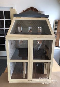 a doll house is built into the floor