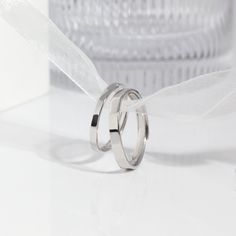 Material: High-Quality Solid 925 Sterling Silver (Nickel-Free and Lead-Free)Color: SilverWidth: 3.0mm and 1.9mm 1.9mm Ring Size: Adjustable, Suitable for Sizes from 3 to 102.8mm Ring Size: Adjustable, Suitable for Sizes from 5 to 14Packaging: Complimentary Gift Box and Jewelry Pouch Care Instructions: Sterling silver can be worn in the shower and will not rust. Silver will oxidize naturally, use a gentle silver cleanser or a silver polishing cloth to clean and re-shine as needed. Store your jewe Minimalist Polished Couple Promise Rings, Minimalist Couple Rings With Polished Finish, Modern Sterling Silver Stackable Couple Rings, Minimalist Sterling Silver Couple Rings For Anniversary, Modern Stackable Couple Rings In Sterling Silver, Minimalist Silver Couple Rings For Promise, Minimalist Stackable Sterling Silver Couple Rings, Minimalist White Gold Couple Rings With Polished Finish, Minimalist Stackable Couple Rings For Anniversary