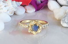 Don't miss this opportunity to own this beautiful gemstone ring crafted in 14k gold filled => Gemstone Type - Labradorite, Clear Quartz => Gemstone Cut - Faceted => Gemstone Size - 4.5 mm, 2 mm => Gemstone Shape - Round Shape => Total Number of Gemstones - 11 => Metal Type - 14k Gold Filled (Tarnish Resistant And Nickel Free) - also available in 925 sterling silver * Please contact me for pricing on a sizes larger than 11 * ~ Feel free to ask me about custom made designs. ❏ Rep Opal Necklace Simple, Grey Ring, Rainbow Ring, Jewish Jewelry, Rainbow Rings, Simple Stud Earrings, Jewelry Catalog, Gold Statement Ring, Labradorite Ring