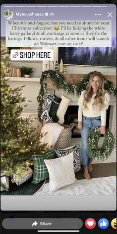 a woman sitting in front of a christmas tree