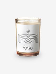 D.S. & Durga 85 Diesel Candle by D.S. & Durga Home Accessories New Candles and Home Fragrance 4" H x 2.75" Diameter / White / Wax Aromatic Candle, White Violet, Fragrance Ingredients, Aromatic Candles, Leather Seats, Heart Notes, Diesel Fuel, Oil Plant, Classic Rock