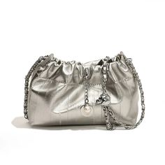 45454498136285 Silver Pouch Bag With Chain Strap, Silver Evening Pouch, Silver Pouch Shoulder Bag With Chain Strap, Silver Shoulder Bag With Chain Strap Pouch, Trendy Silver Pouch Clutch, Silver Large Capacity Shoulder Bag For Evening, Silver Evening Shoulder Bag With Large Capacity, Trendy Silver Pouch Shoulder Bag, Large Capacity Elegant Pouch