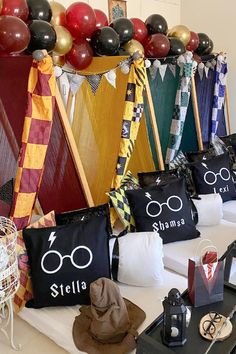 some harry potter themed party decorations and balloons