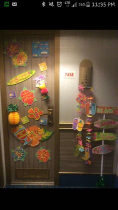 the door is decorated with colorful paper decorations