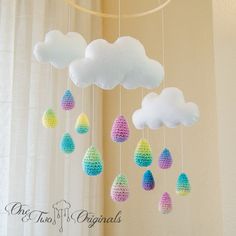 crochet clouds and raindrops hanging from the ceiling