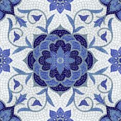 a blue and white tile design with an intricate flower in the center, on a white background