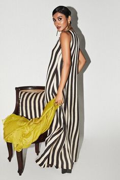 Black, beige colorblock dress with stripe print and a U neckline. - Aza Fashions Chic Striped Evening Maxi Dress, Striped Maxi Dress For Summer Evenings, Chic Striped Maxi Dress, Sleeveless Vertical Striped Summer Dresses, Striped Summer Evening Dresses, Chic Maxi Dress With Vertical Stripes, Elegant Summer Dress With Vertical Stripes, Striped Evening Dresses For Summer, Elegant Summer Dresses With Vertical Stripes