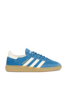 Suede upper with rubber gum sole.  Made in Vietnam.  Lace-up front.  Signature adidas side stripes.  Printed Spezial logo at outer panels.  Padded low-cut collar.  .  .  .  .  .  .  .  .  .  . Handball Spezial, Adidas Spezial, Crystal White, White Crystal, Side Stripe, Blue Cream, Christmas List, Cream White, Low Cut