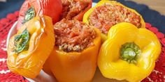 several stuffed peppers on a white plate