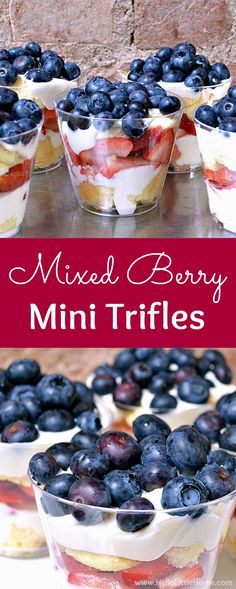 mixed berry mini trifles with blueberries and strawberries in the middle on a table