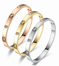 PRICES MAY VARY. Perfect Size : these love bracelets are 17CM (6.7 inches), diameter:2.28" x 1.89", fit your wrist size from 5.3" inches to 6.7" inches. Weight about 20g(0.7oz). 316L stainless steel with 18k gold plating, you can enjoy it for years with little maintenance and no worry about sensitive skin.It contains three colors in total. EXCELLENT CRAFTSMANSHIP AND MATERIALS : Friendship bracelet is made of titanium steel and cubic zirconia, it will not tarnish or lose its luster, easy to wear Luxury Bracelet, Classic Bracelets, Stainless Steel Bangles, Simple Bracelets, Waterproof Jewelry, Valentines Day Weddings, Dainty Bracelets, Layered Jewelry, Love Bracelets